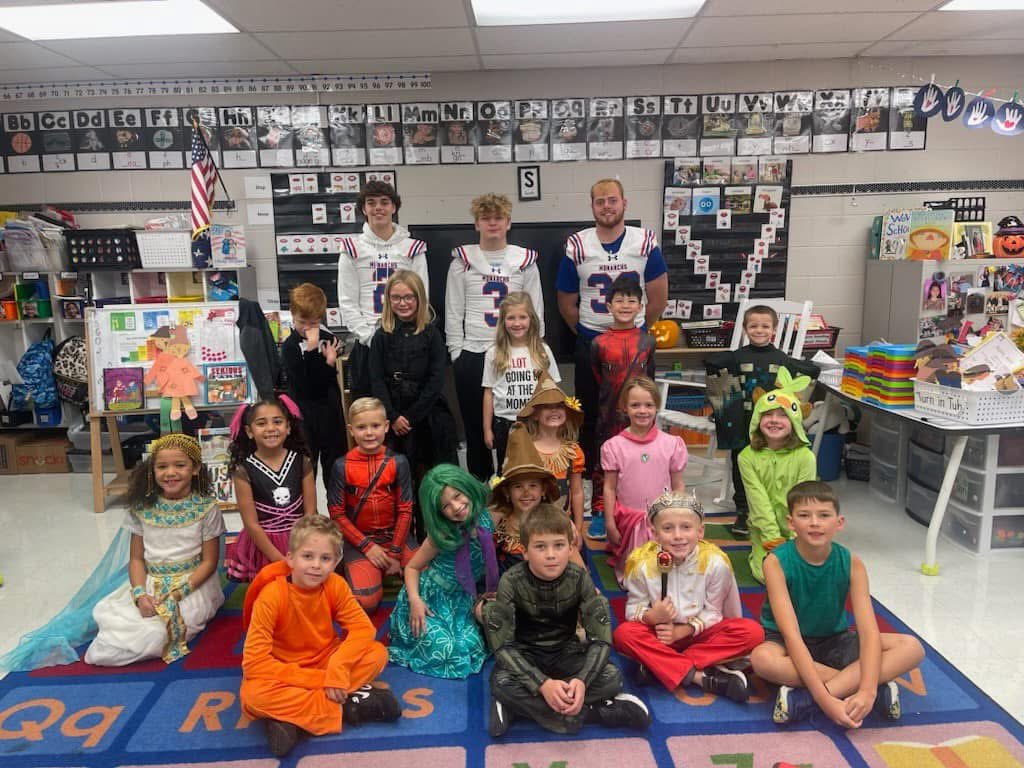 Monarch football seniors had a blast this morning going back to their old elementary school and greeting kids as they arrived at school!  Go Monarchs! #TheProcessrtb