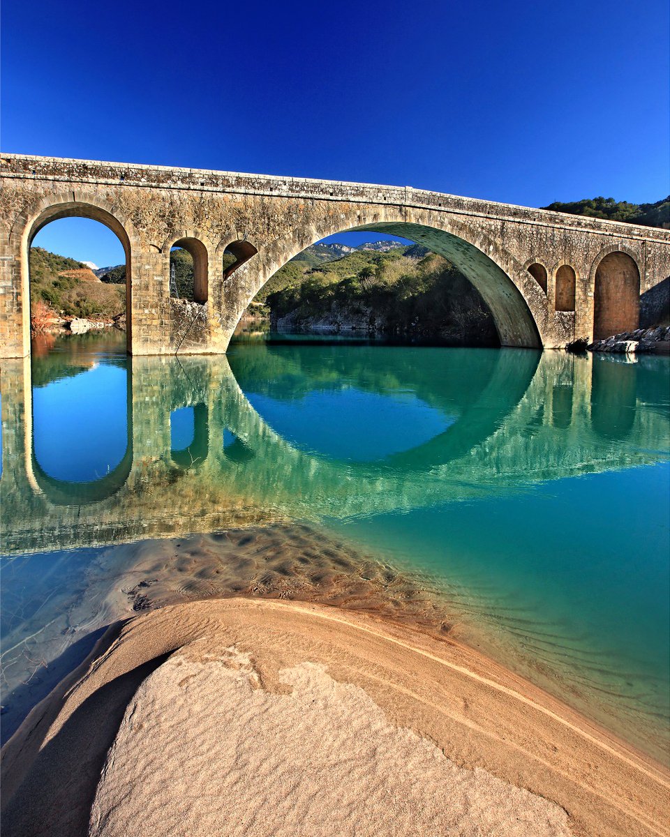 VisitGreecegr's tweet photo. Journey across time with every step on the stone-arched Katafylli-Avlaki #bridge, where the whispers of #Acheloos #river tell a thousand tales.
Which is your favourite bridge in Greece?
#visitgreece #stonebridge https://t.co/2yGBzHxh2f