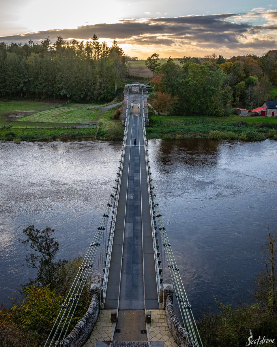 Sunset at the border between Scotland and England - the Union Chain Bridge  just west of Berwick Upon Tweed is the worlds oldest suspension vehicle  road bridge. If you look carefully here