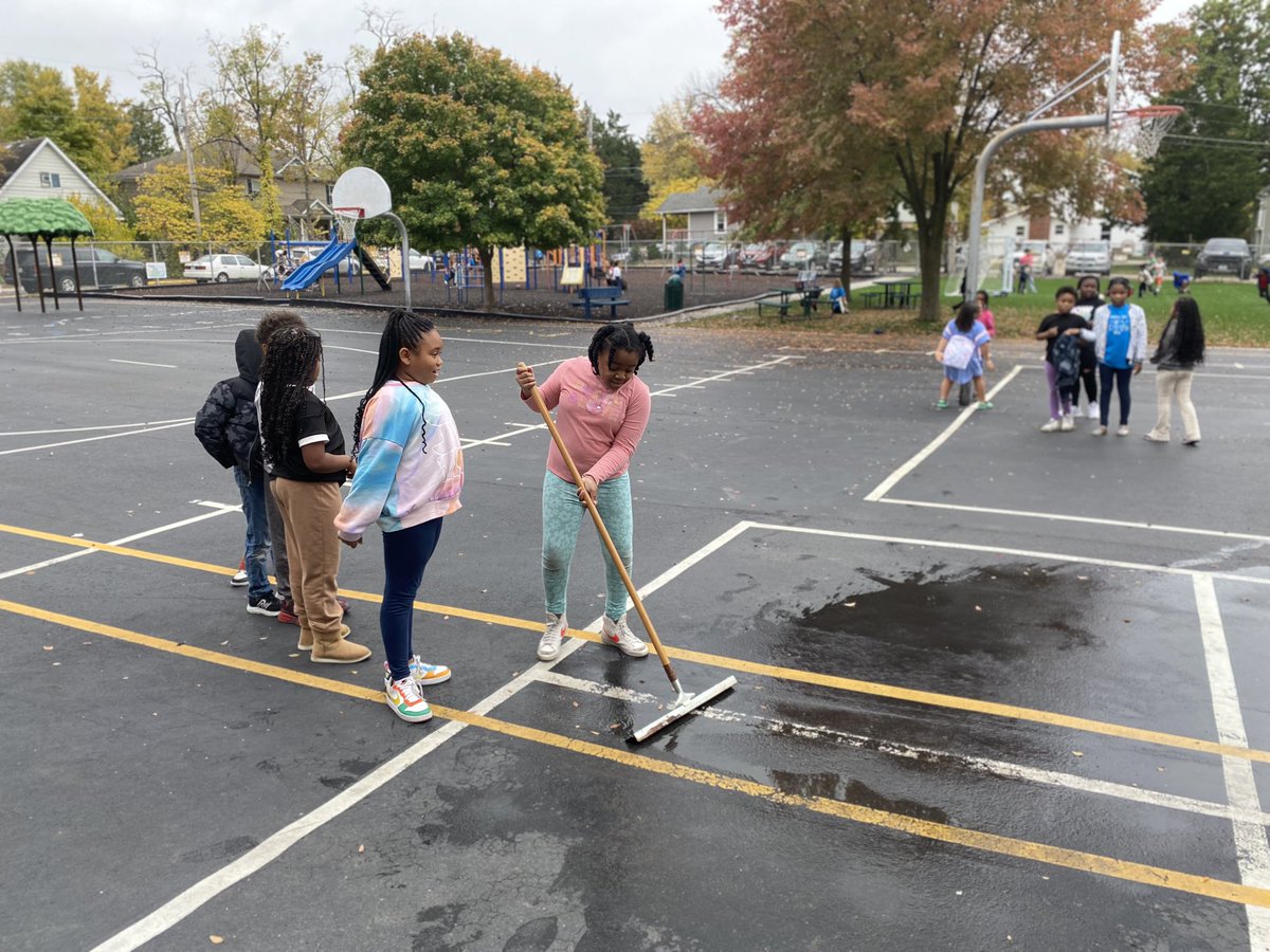 Loving the line of helpers who want to squeegee the puddles off the blacktop at recess today! #BentonBold