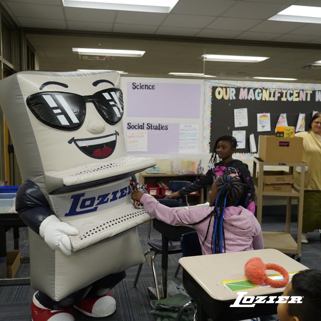 Lozier's mascot TL and Scooby-Doo did a little reverse trick or treating at Franklin Elementary School Wednesday. The pair went from classroom to classroom passing out 240 goodie bags of candy with Lozier branded TL stickers and temporary tattoos!