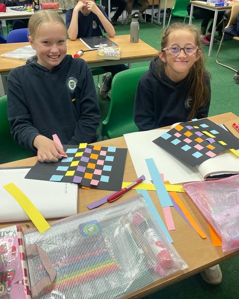 nlancingprimary's tweet image. Year 6 have been making a piece of #art inspired by kente cloth. They made these out of paper and very colourful they look too. 😀