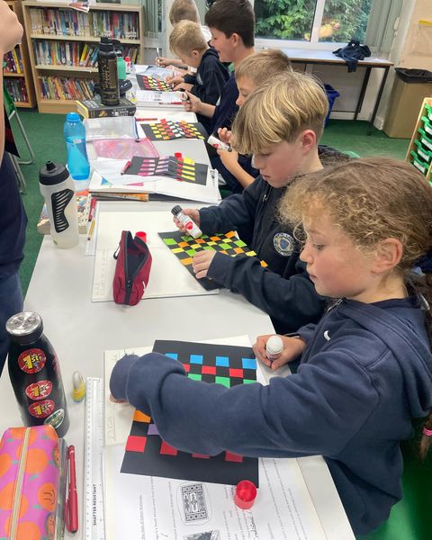 nlancingprimary's tweet image. Year 6 have been making a piece of #art inspired by kente cloth. They made these out of paper and very colourful they look too. 😀