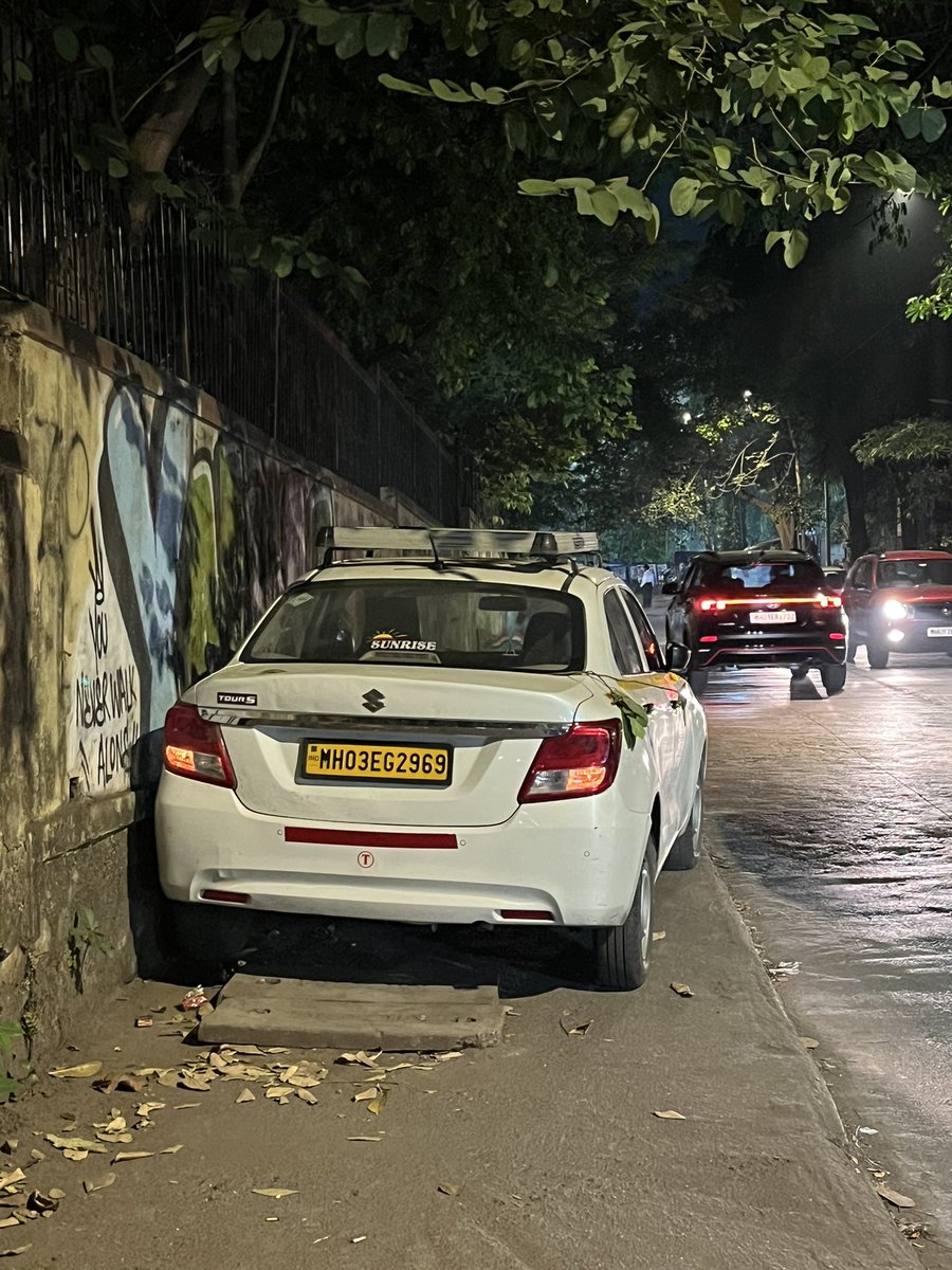I think this driver has parked the car in the wrong spot <a href="/MTPHereToHelp/">Mumbai Traffic Police</a>. Shall we charge him/ her a parking fee? 

Location: Powai, Near S.M. Shetty School
Time: 10 PM 
Date: 25th Oct 2024

<a href="/MumbaiPolice/">मुंबई पोलीस Mumbai Police</a>