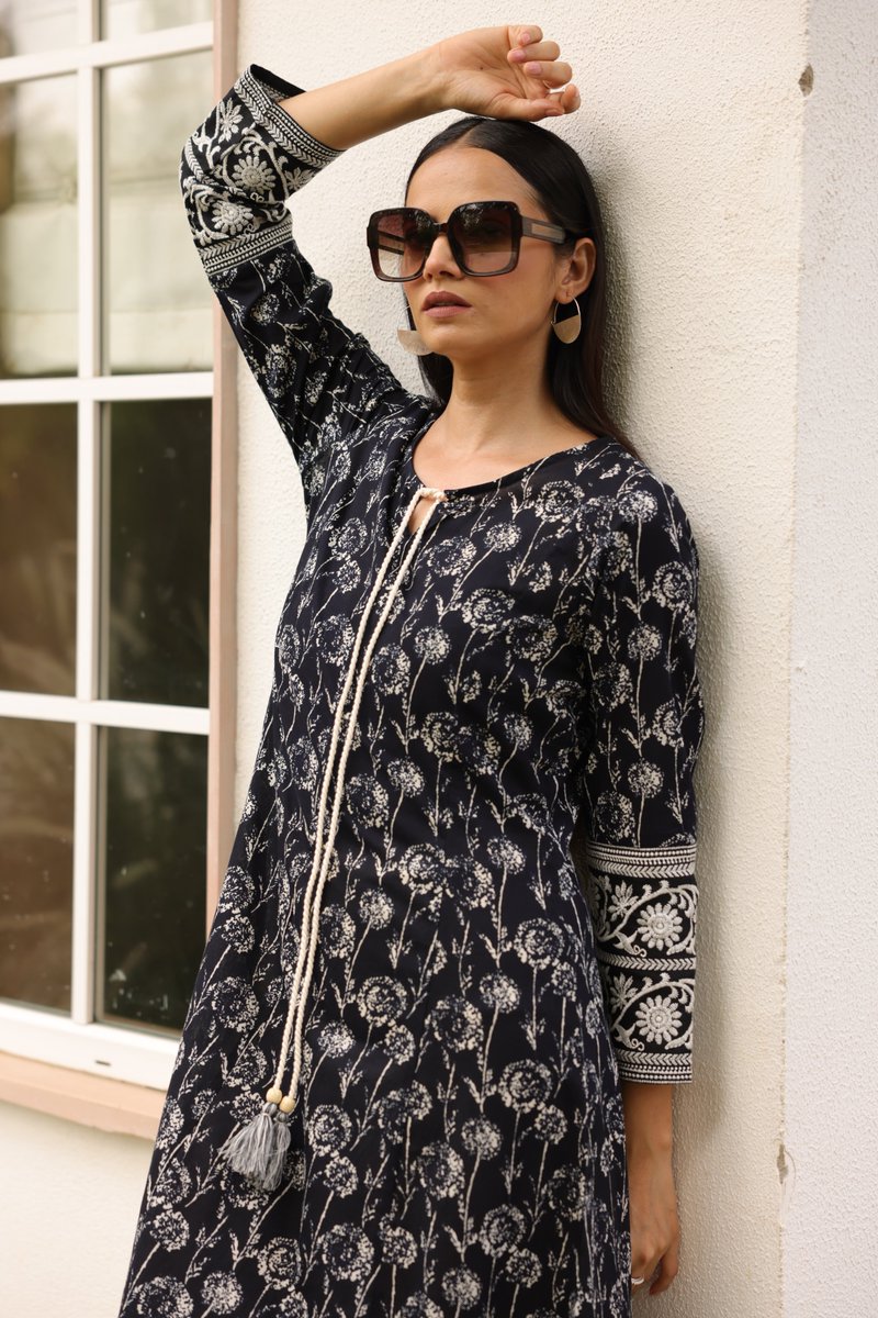 saffron_threads's tweet photo. Effortlessly chic in black 🖤 Our cotton embroidered dress with a classic neck tie-up is perfect for any occasion. Dress it up or keep it casual – style your way! https://t.co/S5x3R1r5VC