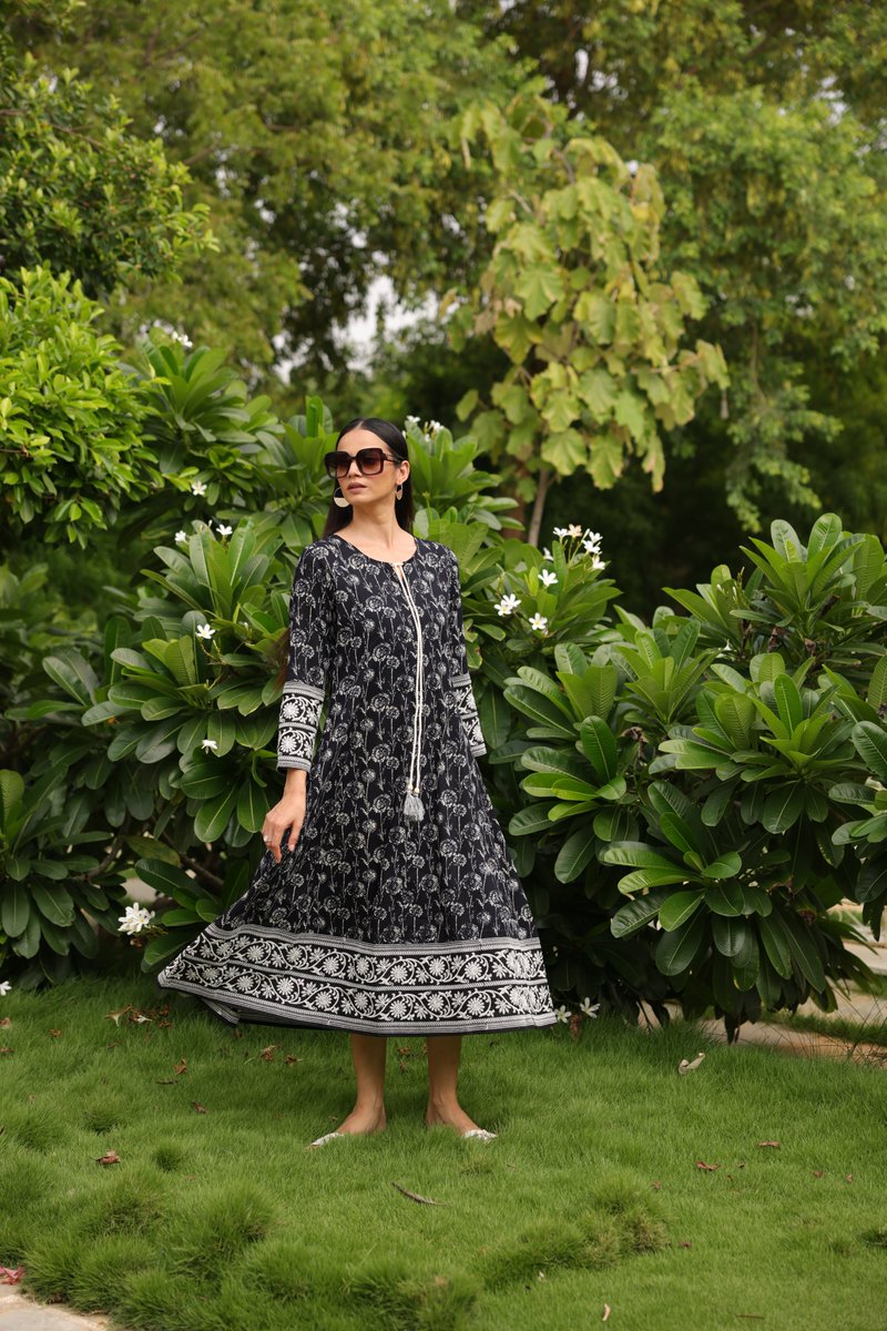 saffron_threads's tweet photo. Effortlessly chic in black 🖤 Our cotton embroidered dress with a classic neck tie-up is perfect for any occasion. Dress it up or keep it casual – style your way! https://t.co/S5x3R1r5VC
