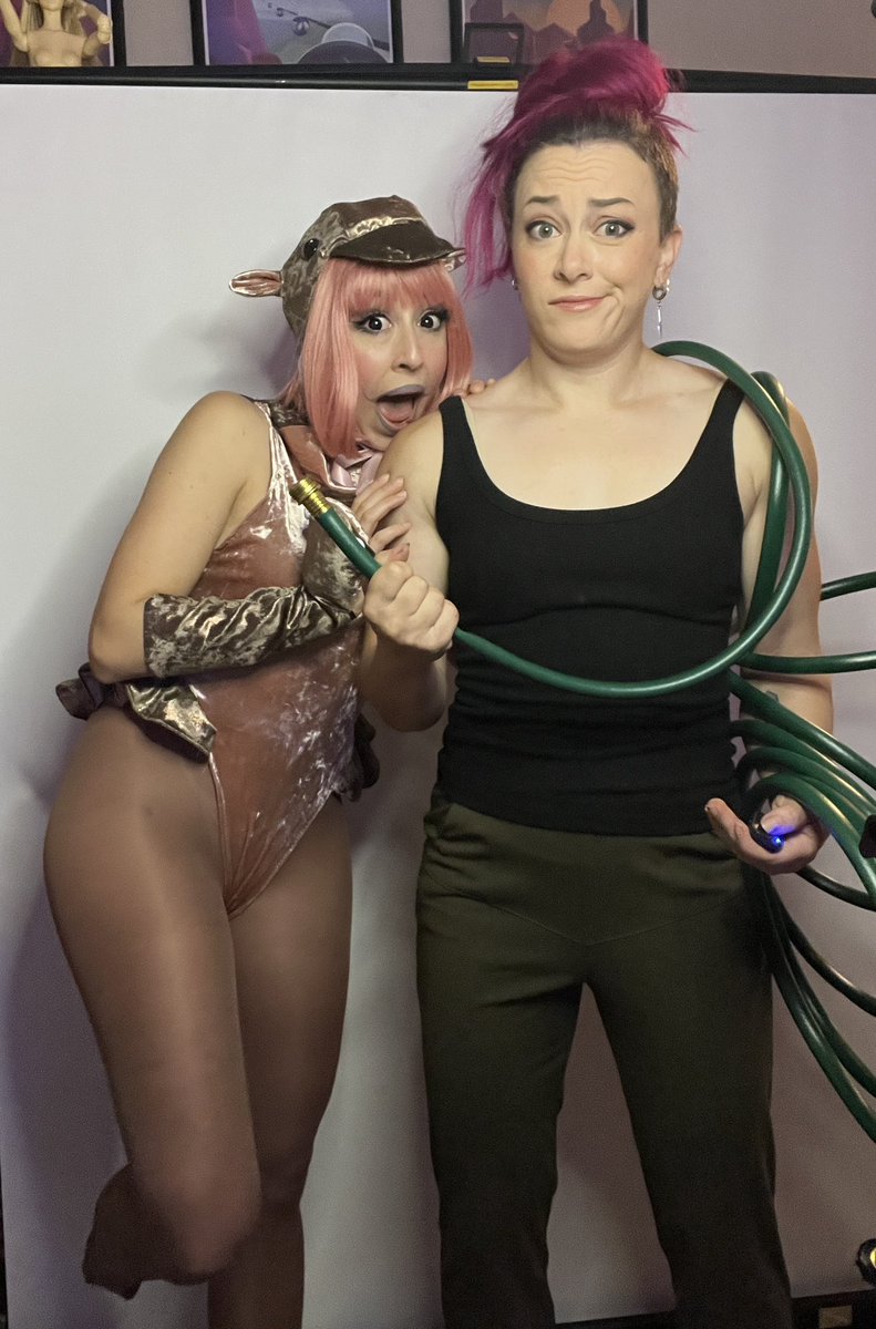 ClaireMax's tweet image. She wanted to be Moo Deng, so the only logical choice was for me to go as “harried zookeeper who constantly gets chomped on” (complete with hose)

Moo Deng costume made by me 😂