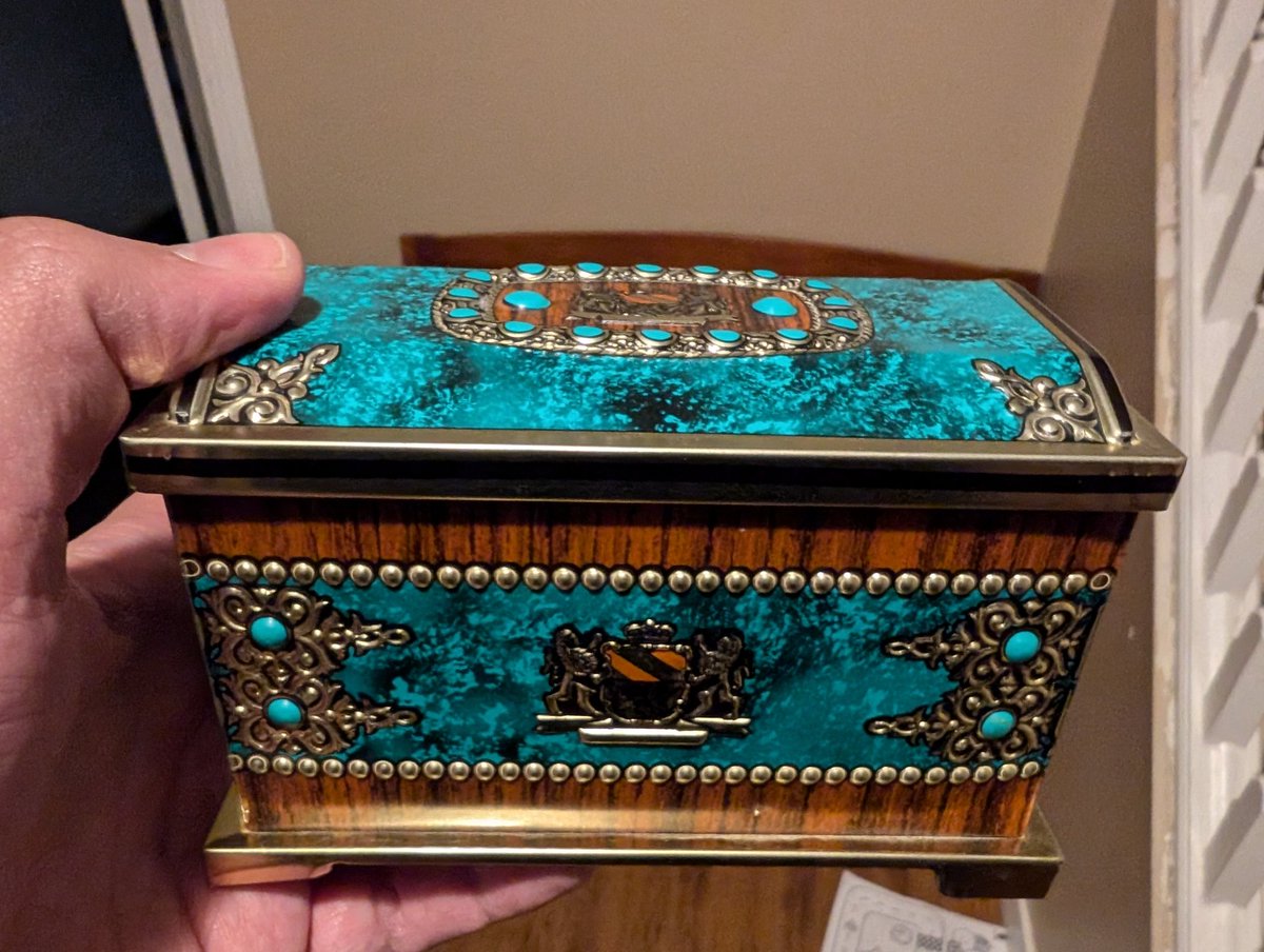 cameronboyes's tweet photo. Saw my sister last night, and she gave me this tin she bought at the thrift store in Watson Saskatchewan that used to be our great grandpa's pharmacy.  It's perfect for holding bags of dice. https://t.co/tCtS62FA2a