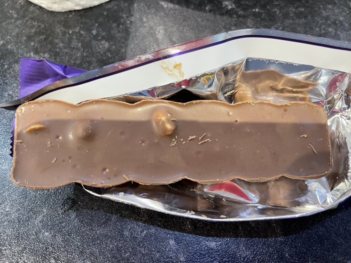 DesignByDrina's tweet photo. Totally disappointed in my Cadbury’s wholenut bar! @CadburyUK It needs rebranding to be called cadburys quarternut! Thats being generous 🙄 https://t.co/Jvji9lJR1e