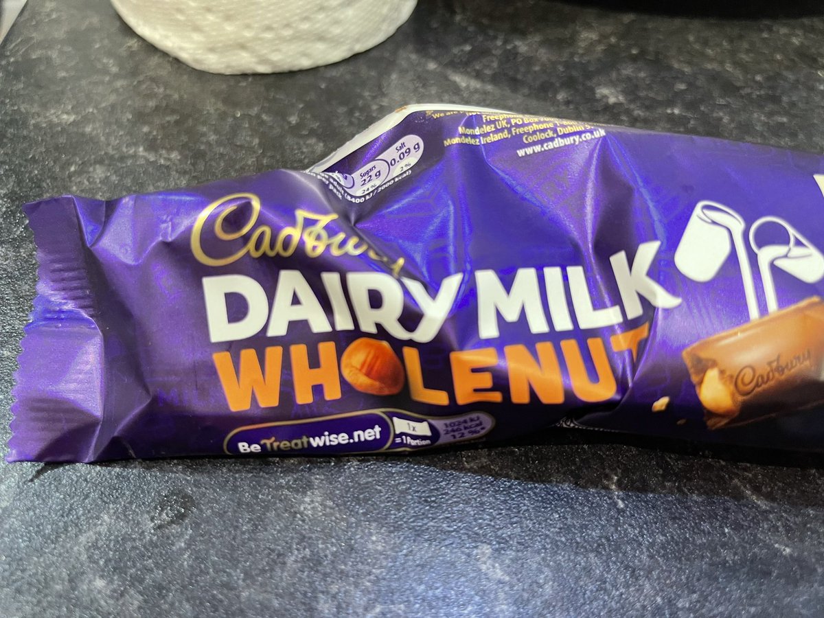 DesignByDrina's tweet photo. Totally disappointed in my Cadbury’s wholenut bar! @CadburyUK It needs rebranding to be called cadburys quarternut! Thats being generous 🙄 https://t.co/Jvji9lJR1e