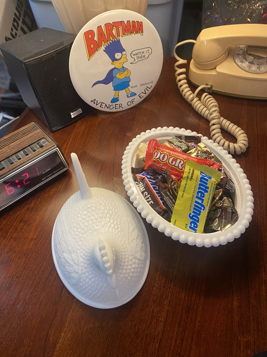 I realized my 80s end table was missing one critical thing: a milk glass candy dish shaped like a chicken. Duh! It reminded me of my grandparents house, which is oddly comforting.