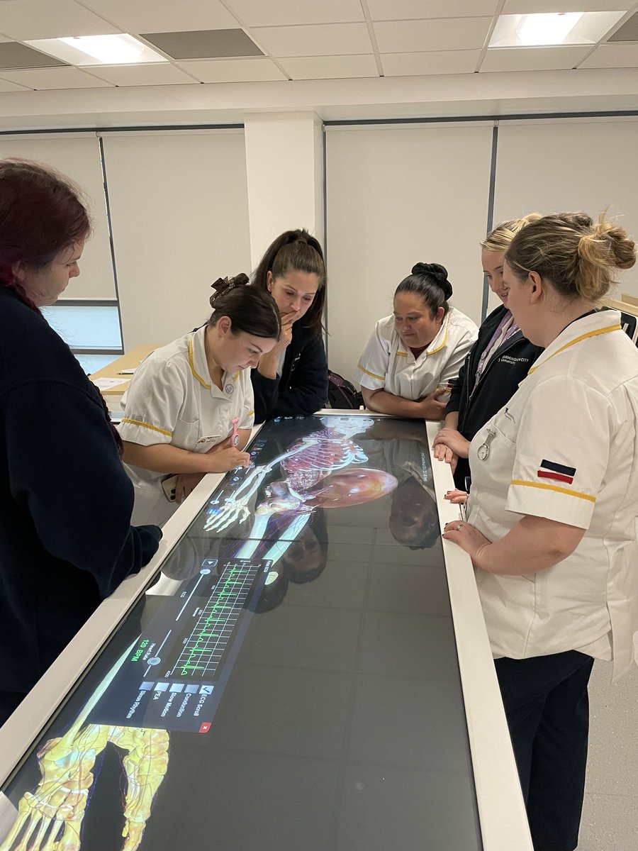 BCUMidwives's tweet photo. Meet some of our second year student midwives enhancing their understanding of  anatomy with our Anatomage  tables. All part of learning about cannulation and catheterisation. https://t.co/YAs52mXA5w