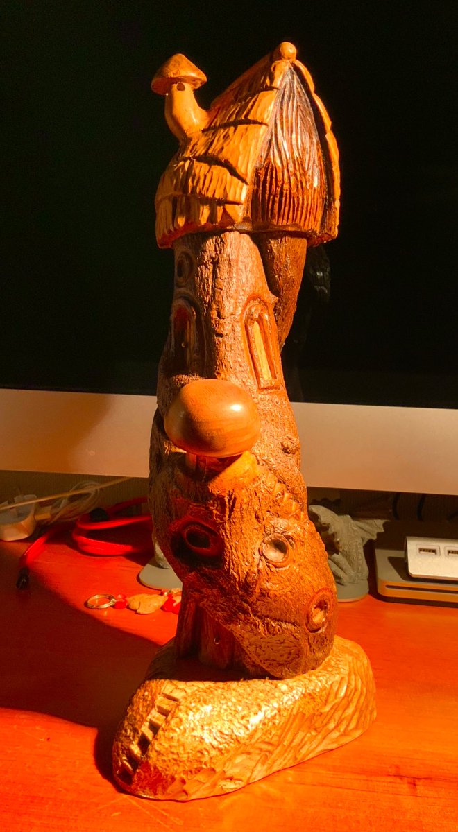 This twisty fairy house was starved by the vine strangling it