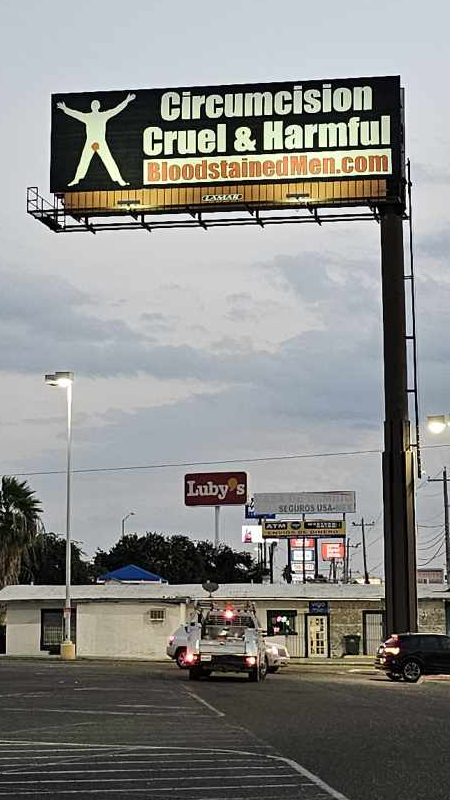 Bloodstained Men billboard will be up to the end of December. It towers over I-35 South on the left and is located in Laredo at 5001 San Dario Ave.