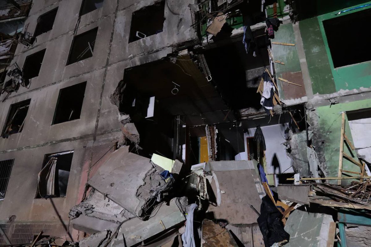 KyivPost's tweet photo. Rescuers are currently on the scene in Kharkiv where Russians targeted a high-rise building with aerial bombs.

There are already 25 victims, including one baby.

The genocide of Ukraine continues with a complicit US that forbids Ukraine from striking back. https://t.co/5jtIt9K3HB