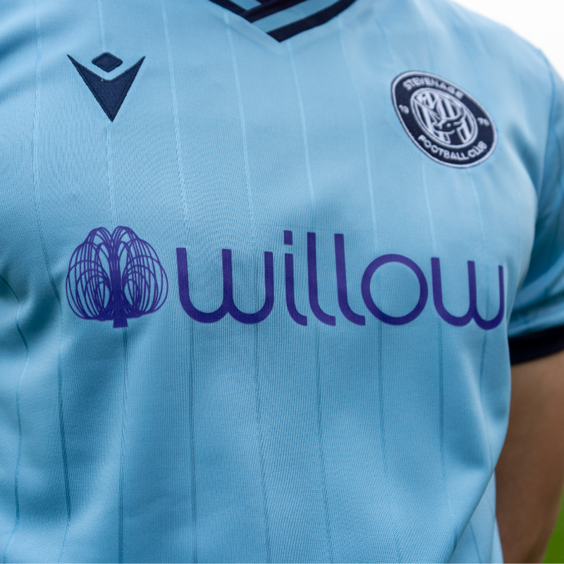 StevenageFC's tweet photo. Our 2024/25 Third Kit, in partnership with @Willow_Fdn. 🩵💜

25% of profit from sales will help Willow create magical moments for seriously ill 16-40 year olds.

👕 https://t.co/jrawHMvLXN