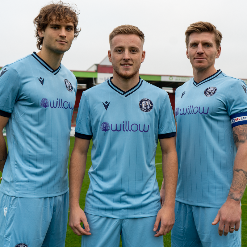 StevenageFC's tweet photo. Our 2024/25 Third Kit, in partnership with @Willow_Fdn. 🩵💜

25% of profit from sales will help Willow create magical moments for seriously ill 16-40 year olds.

👕 https://t.co/jrawHMvLXN