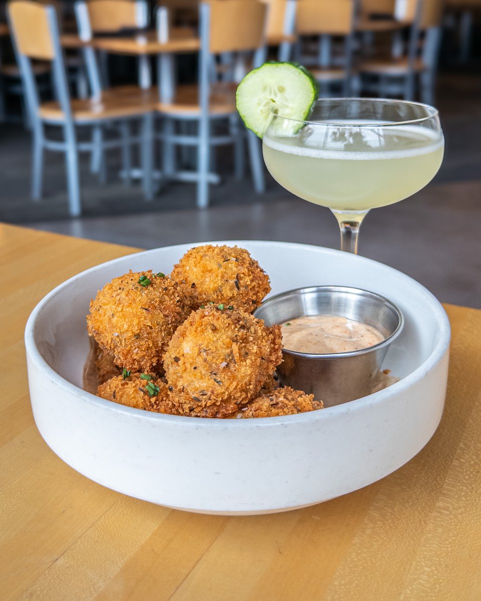 DESTIHL_Rest's tweet photo. Our 𝐂𝐎𝐃 𝐂𝐑𝐎𝐐𝐔𝐄𝐓𝐓𝐄𝐒 Chef's Feature are perfect to share! Served with Old Bay mayo for dipping, these flavorful bites pair well with our refreshing "Longing for Summer" craft cocktail. https://t.co/XFZvlhAITP