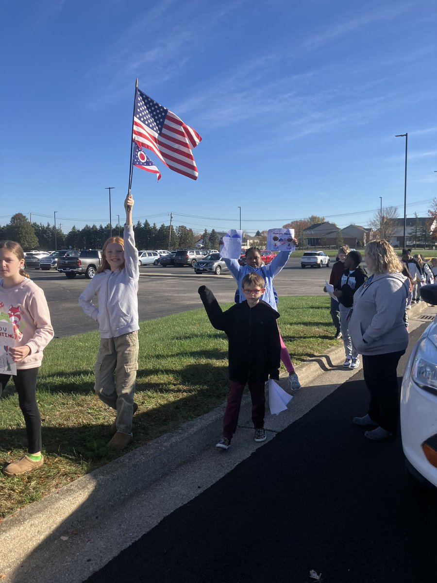fcsdeast's tweet photo. East students proudly held signs and waved flags during Fairfield Township’s Veteran’s Day Parade. https://t.co/XEqFAwUYnw