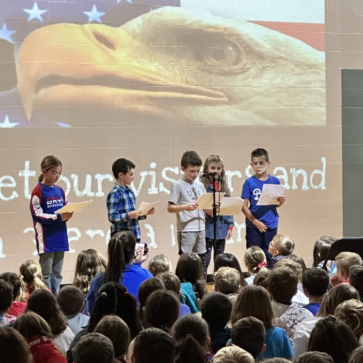 BaySchoolsOH's tweet photo. The inaugural Westerly All-School Veterans Day Assembly! Thank you, Veterans, for your service! #PurpleStarDistrict https://t.co/elPqHBC2ra