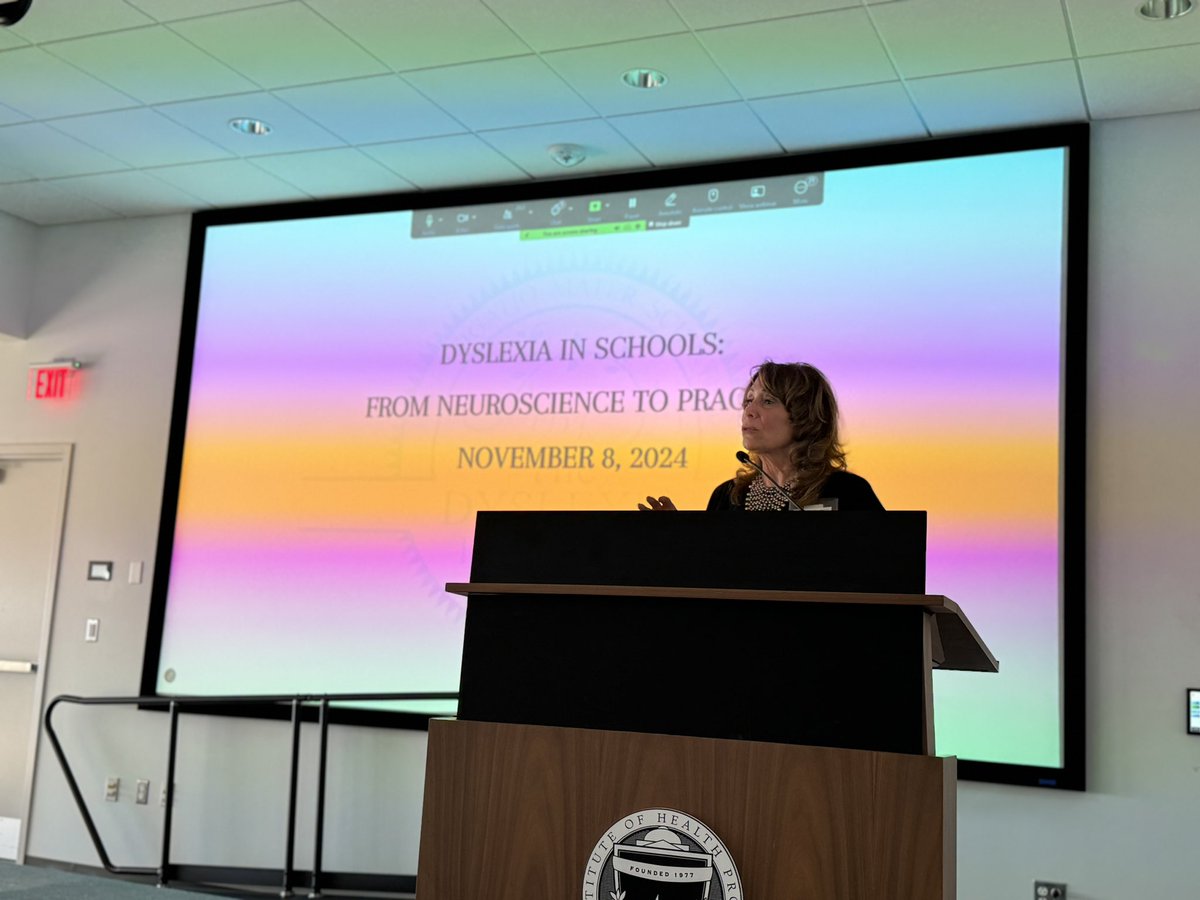 Joan Mele McCarthy kicking off the The Dyslexia Foundation “#Dyslexia in Schools” symposium… the screen is not actually rainbow color… but my iPhone camera is apparently also a strong believer in this important work. 😀 next up… <a href="/olaozpa/">Ola Ozernov-Palchik</a>