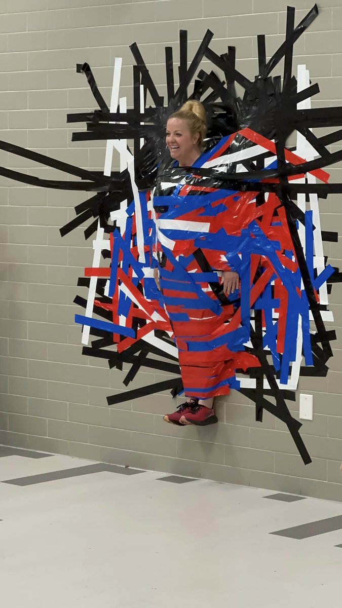 YalePTA's tweet photo. Principal @ccgreer28 *stuck* to her word and let our more than 130 student PTA members tape her to the cafeteria wall today! 🤣 Way to go, @yaleroadrunners!  ❤️💙

Haven't joined PTA yet? Get in on the fun here: https://t.co/fcE0NS8GpW https://t.co/HcuI5tpvjF