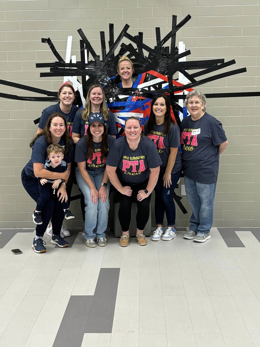 YalePTA's tweet photo. Principal @ccgreer28 *stuck* to her word and let our more than 130 student PTA members tape her to the cafeteria wall today! 🤣 Way to go, @yaleroadrunners!  ❤️💙

Haven't joined PTA yet? Get in on the fun here: https://t.co/fcE0NS8GpW https://t.co/HcuI5tpvjF