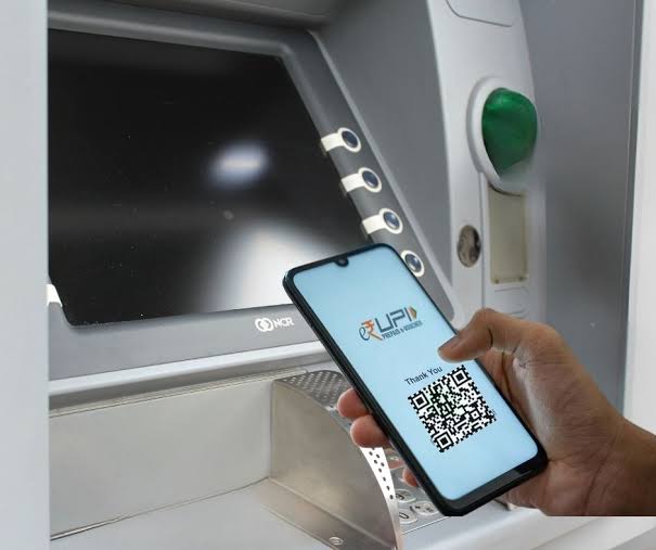 ParadavaRakesh's tweet photo. Needed cash but didn’t have my ATM card. Thankfully, ATMs now support UPI withdrawals! Selected the option, scanned the QR code, and had my cash in less than 45 seconds. Truly amazed by India’s UPI progress. Thanks to @narendramodi &amp; @RBI for making this innovation possible! #UPI https://t.co/h46ZX3vrGC