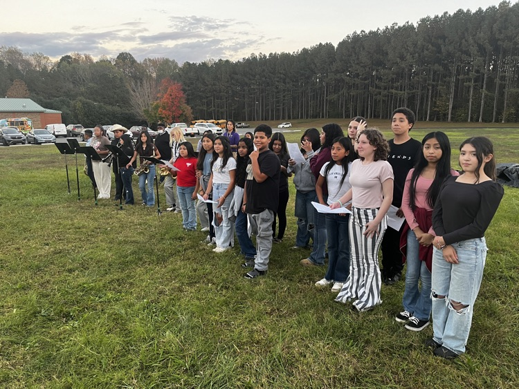 We were blown away by the artistry now on display at <a href="/ChathamMiddle/">CMS</a>, as the CMS NCMA AIM Art Club held an unveiling of the new school mural they've been creating for months! What a beautiful representation of the city and the school. 💜💛 #OneChatham #CMS family