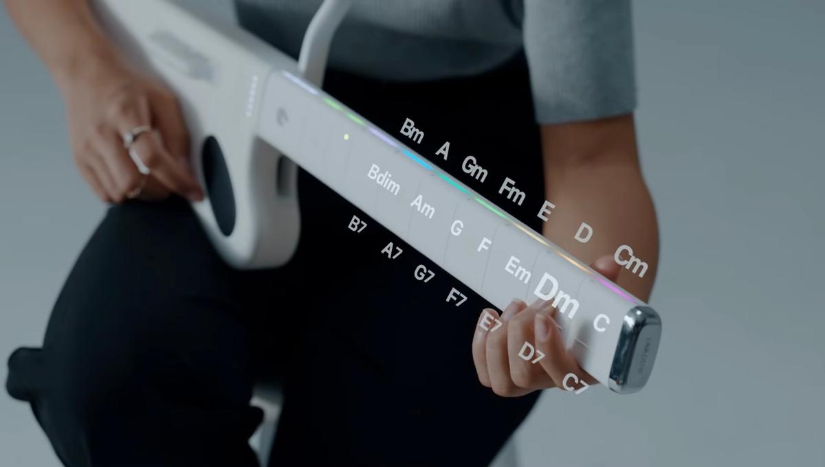 eyasu_software's tweet photo. 🎸 Let Me Play: Meet the Guitar Without Strings

The LAVA GENIE  is a stringless sampler guitar, letting players create music by tapping and swiping on its interactive fingerboard. 

Compact and portable, it’s priced at $349, with shipping expected to start in December 2024 https://t.co/R49aI5Ii9k