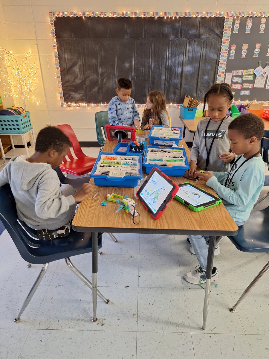 NNPSJenkins's tweet photo. Honoring National STEM Day with engaging, hands-on learning! Students from Ms. Salaam's class dive into collaborative STEM activities with Instructional Technology Coach Betsy Orlando, reinforcing their Science unit on Force, Motion, and Energy. #NationalSTEMDay #NNPSProud https://t.co/iA4YCI5lzz