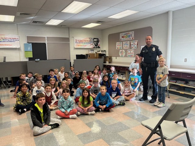 Officer High visited 1st and 2nd grade classes at Denver to talk about his role in the community.