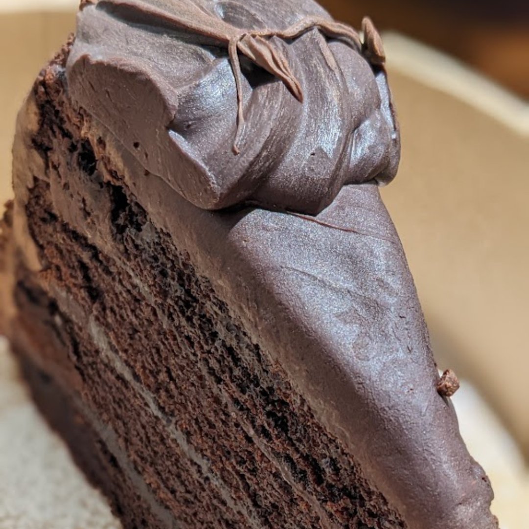 OdooCafe's tweet photo. Craving something sweet? 🍫 

Our luscious Chocolate Cake is calling your name! 

Swing by Odoo Café and treat yourself to a slice (or two) of pure chocolate bliss.

You deserve it! 🍰😋 

#ChocolateCake #TreatYourself #OdooCafe https://t.co/dMs4kWeCDJ