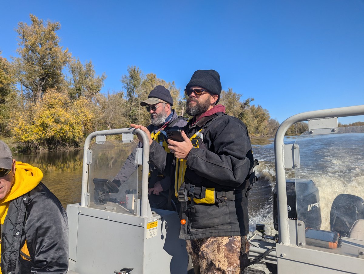 IGS staff, Matthew Streeter, Tom Stoeffler and Keith Schilling sampling monitored wells in Muscatine County for PFAS study with IIHR Research scientist Marty St. Clair. Boat ride on Mississippi River to collect mid-river sample and well sample from interior river island.