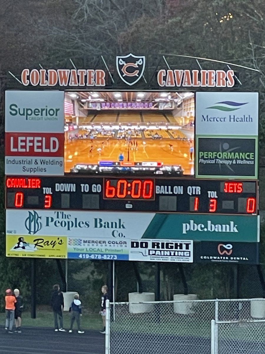 ColdwaterAD's tweet photo. Football supporting Lady Cav volleyball on video board as football team warms up https://t.co/cCOiPAp7hd