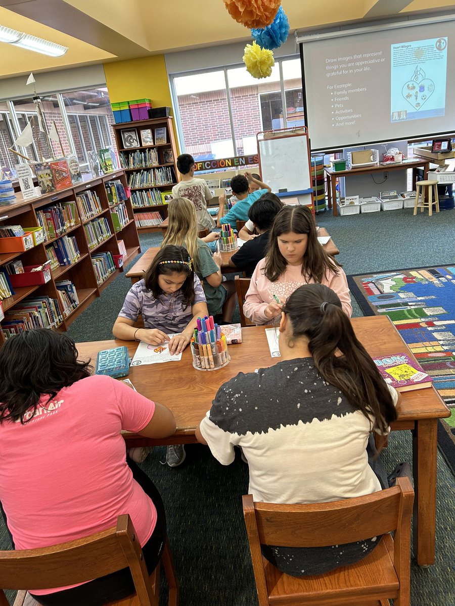 TW in the lib <a href="/BluebonnetLions/">Bluebonnet Elementary School</a> 4th &amp; 5th grdrs read the <a href="/riverabookaward/">Tomás Rivera Mexican American Childrens Book Award</a> winner Spanish is the Language of my Family by @MGenhart illus. by <a href="/johnparraart/">John Parra</a> &amp; created their own Heart Milagros to show the things they appreciate in their lives. The kids ❤️ the 📖 &amp; their HMs are 🤩