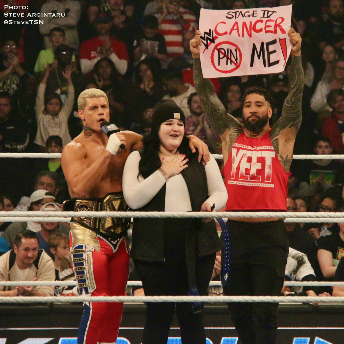 SteveTSN's tweet photo. Nice moment at the end of the night. 

I think the woman’s name is Jessie if I heard correctly. Cody Rhodes gave her his weight belt. 

“Stage 4 cancer can’t pin me.”

#SmackDown https://t.co/VBvX5vlLm4