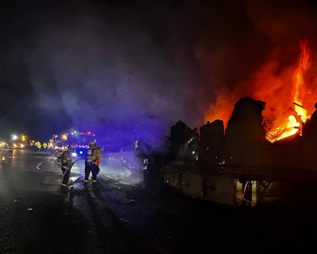 NSWRFS's tweet photo. #RFS crews are working to contain a fire in the trailer of a B-Double truck on the Pacific Hwy near Glenugie, approximately 15km south east of Grafton. One of two southbound lanes is closed for firefighting operations. Motorists should be aware of smoke and drive to conditions. https://t.co/QRwtDvbRdA