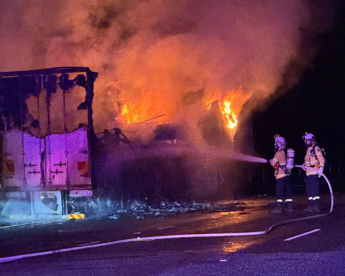 NSWRFS's tweet photo. #RFS crews are working to contain a fire in the trailer of a B-Double truck on the Pacific Hwy near Glenugie, approximately 15km south east of Grafton. One of two southbound lanes is closed for firefighting operations. Motorists should be aware of smoke and drive to conditions. https://t.co/QRwtDvbRdA