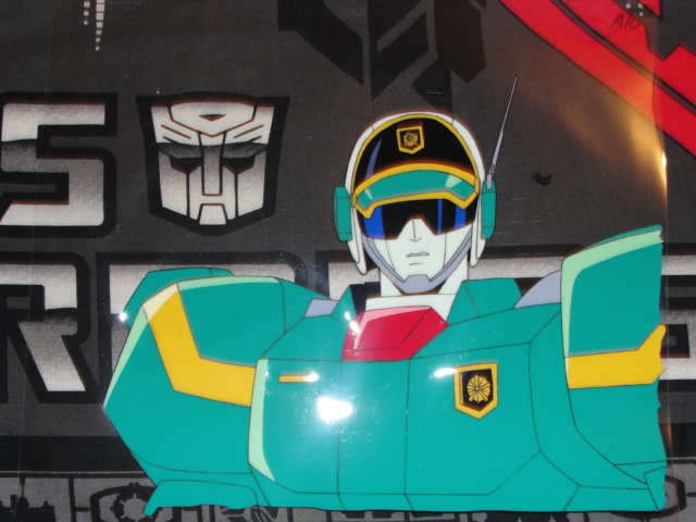 LascielsShadow's tweet photo. Posted a pic before, but here are better photos because I finally got up the nerve to take him out of his three layers of protective plastic so you can see the actual colours. Original cel of my fave boy Gunmax from Brave Police J-Decker, my favourite non-Transformers mecha show https://t.co/K6DJHZobTT