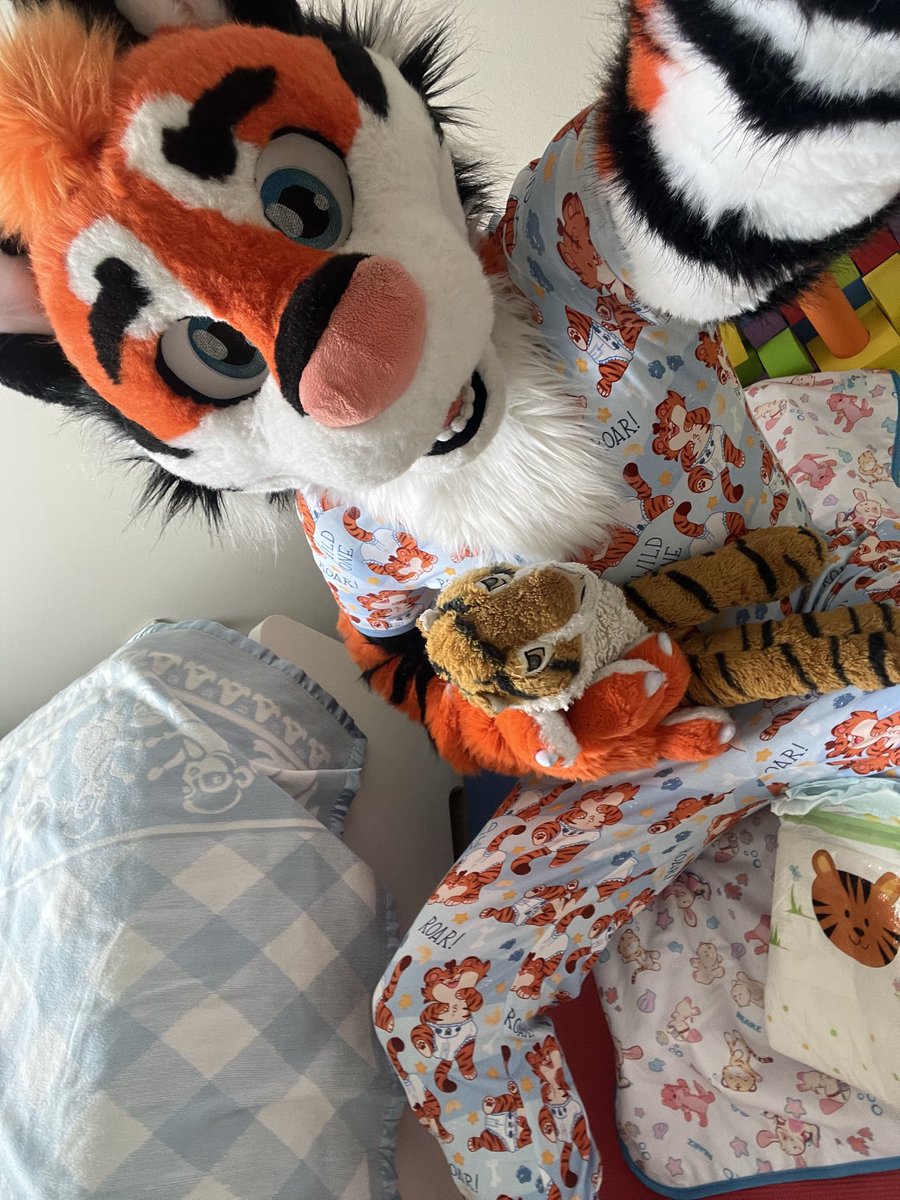 StripyRand's tweet photo. wearing the new @OnesieDownunder tiger pajamas to bed :3 https://t.co/PwShmXVlhd