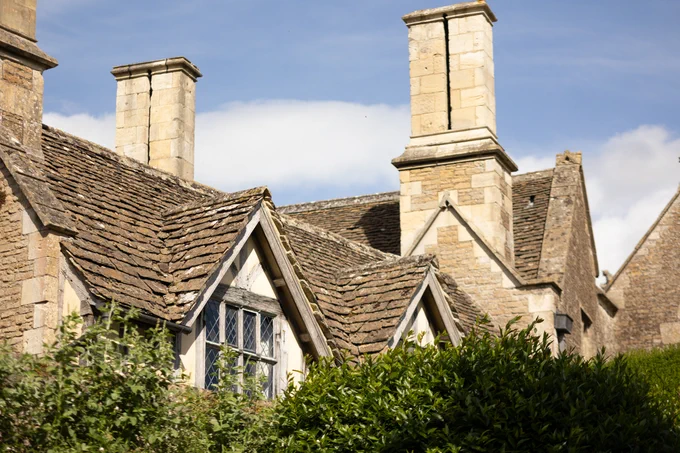 A view of the roof and gable windows of Great Chilfield Hall. 