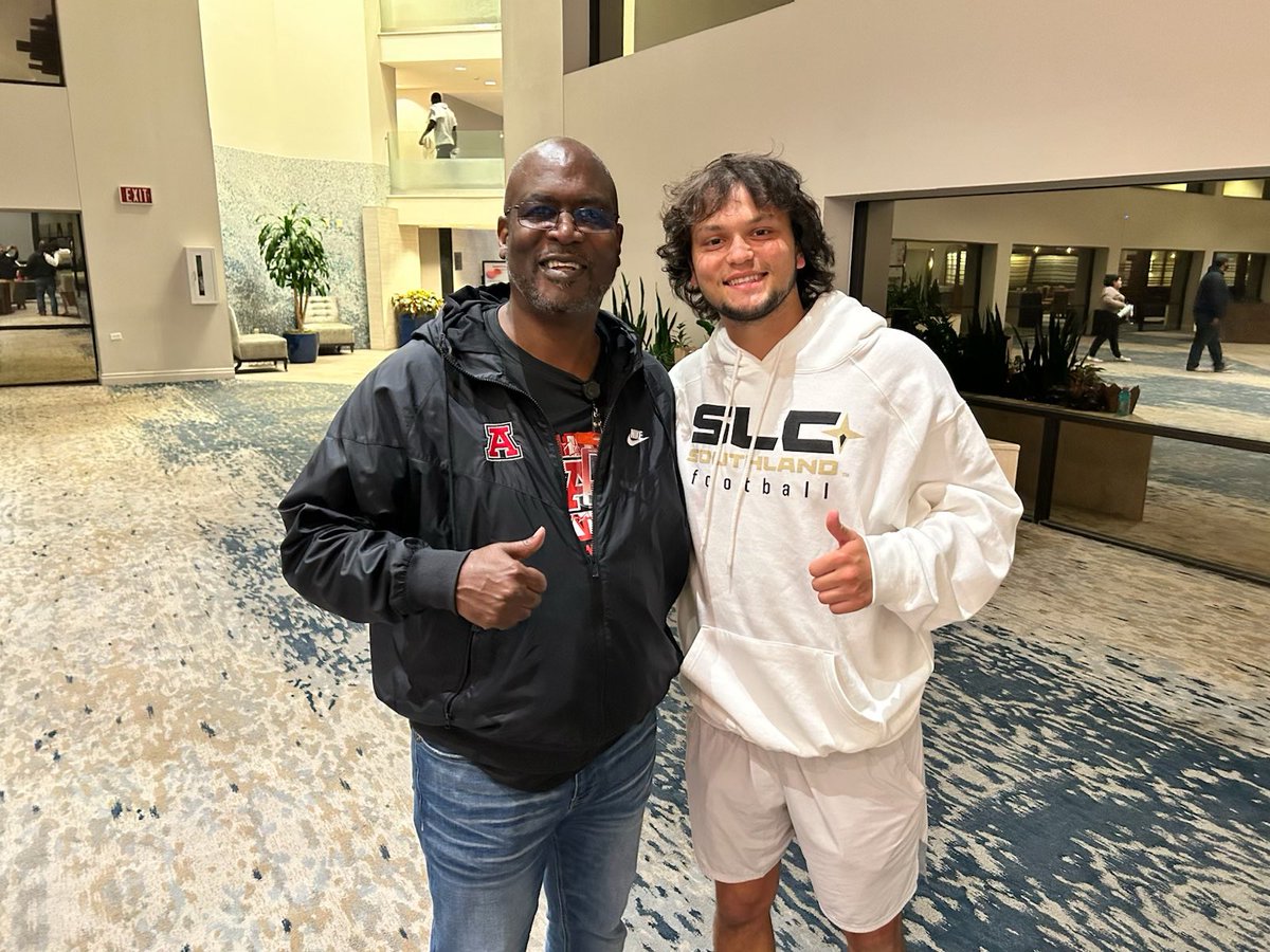 SFAHS_Bulldogs's tweet photo. Mr. Long with band & angels at the hotel last night & saw this guy, Avery Hughes, Austin alum class of 2020 he's playing football at Lamar University and they are in town to play Incarnate Word. Small world ๐ #AHSAlumni #Classof2020 #BeTheDifference https://t.co/GzQaVEhI0F