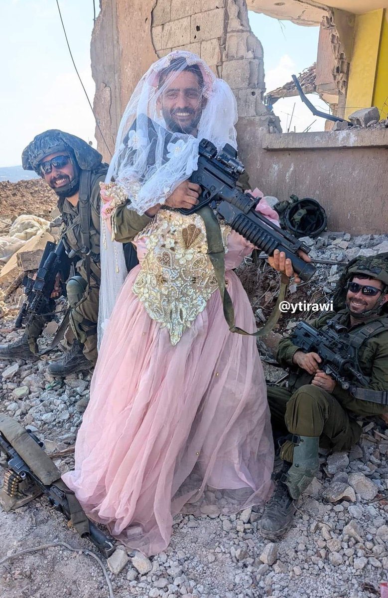 omarsuleiman's tweet photo. The most moral army in the world, constantly posting pictures of themselves in the dresses and undergarments of their victims amongst women, and playing with the toys of the children they murder, all while their funders pontificate to the rest of the world about human rights. https://t.co/BKiyIqO8bq
