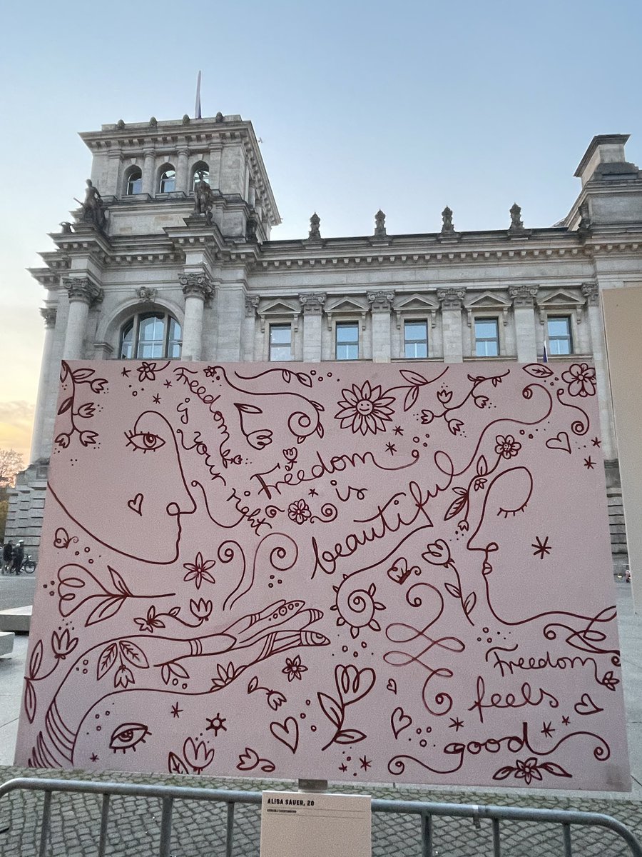 This afternoon in Berlin, I had a powerful encounter that I will never forget. As I was taking a photo of this sign commemorating the fall of the Berlin Wall, a woman tapped me on the shoulder and asked in German, “Do you like it?” I replied “yes,” but she quickly realized my