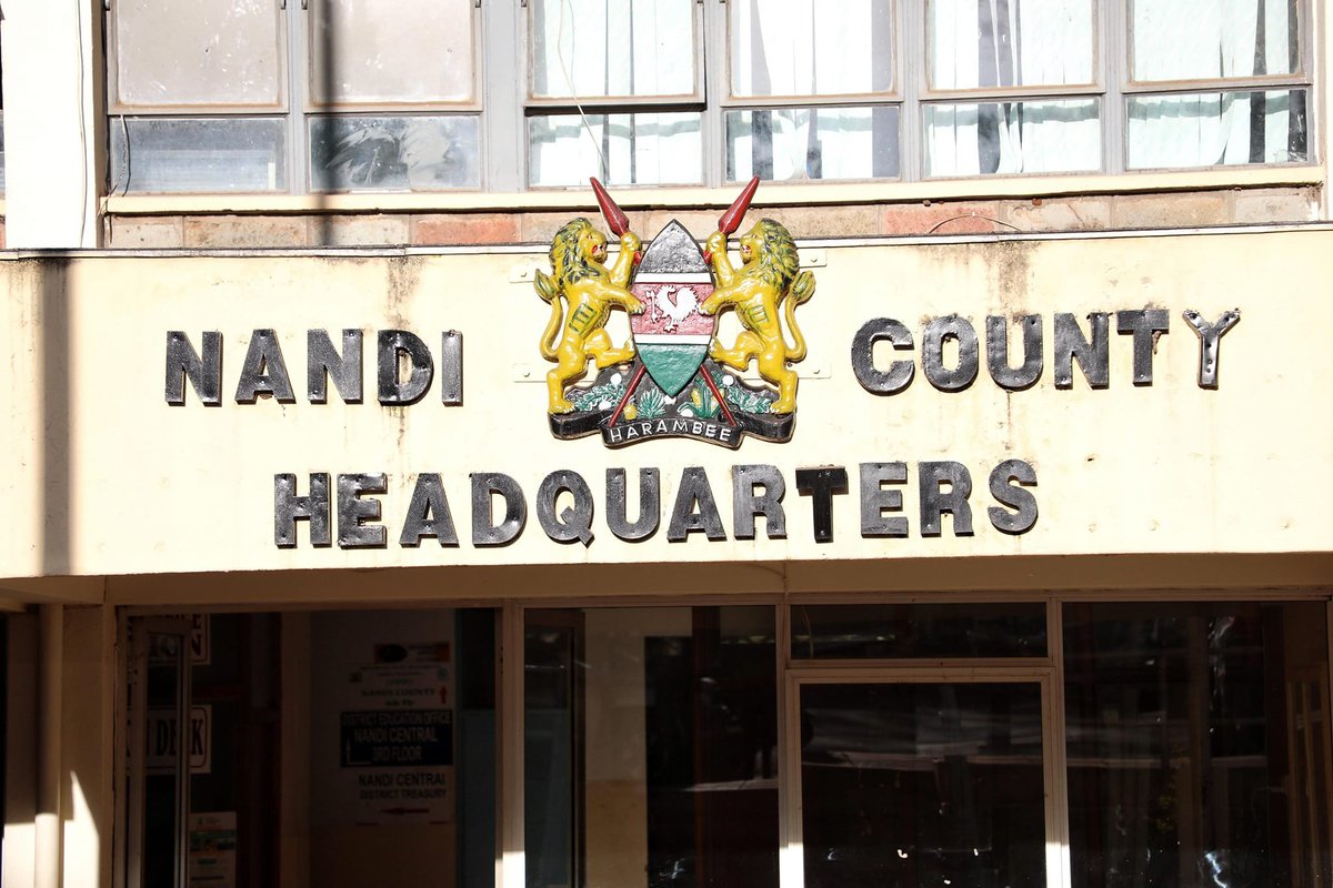 C_NyaKundiH's tweet photo. NOWHERE TO HIDE: Nandi County Officials Cornered in Massive Ksh 6bn Scandal as Investigation Blows Lid Off Systematic Looting

A damning investigation has uncovered widespread corruption and mismanagement in Nandi County where an estimated Ksh 6 billion of taxpayers money allegedly haemorrhaged through ghost projects and irregular procurement.

At a secluded Mombasa hotel, away from prying eyes, investigators pored over evidence which insiders claim was two pickup trucks loaded with damning documents, 108 video clips of abandoned projects, and two terabytes of digital evidence – all painting a picture of what investigators describe as "systematic plunder" of public resources.

The scale of the scandal is shocking. 

Take the water and climate action department, dubbed "the theater of corruption" by investigators.

Here, 1,884 employees were unceremoniously dismissed in what appears to be a calculated move to create space for fraudulent schemes.

The department became a cash cow, with projects existing only on paper while billions vanished into thin air.

The investigation meticulously demonstrates how senior officials, including four County Executive Committee members, allegedly orchestrated what one investigator described as "incoherent grammar and utter misrepresentation of facts" in project documentation. 

Junior officers summoned for questioning became unwitting witnesses to the elaborate scheme, some too generous in their revelations about departmental secrets.

In the health department, investigators uncovered a trail of suspicious procurements and questionable expenditures.

The agriculture sector is not spared either, with evidence suggesting inflated contracts and phantom deliveries. 

Roads and infrastructure projects, many incomplete or shoddily done, stand as concrete testimonies to the misuse of public funds.

The rot runs deep. 

Even the County Public Service Board, meant to be a guardian of proper governance, stands accused of complicity. 

One board member, Ezekiel Chemwor, hastily resigned and declined to appear before investigators, raising eyebrows about what secrets he might be keeping.

To understand the magnitude of this scandal, consider that Ksh 6 billion could have transformed Nandi County's healthcare system, built modern roads, or revolutionized its agricultural sector. 

Instead, investigators found a trail of incomplete projects, suspicious payments and an assemblage of documents carefully crafted to conceal the truth.

The cavalier attitude of some officials during questioning was telling. 

When confronted with evidence, they either feigned ignorance or provided what one committee member described as "hot air" explanations.

This brazenness suggests a deeply entrenched system of corruption that had operated with impunity until now.

Meanwhile, both the Ethics and Anti-Corruption Commission (EACC) and the Directorate of Criminal Investigations (DCI) have trained their sights on this case, suggesting that this might be just the beginning of a larger cleanup operation.

The probe, conducted by a 16-member county assembly ad-hoc committee co-chaired by Benjamin Kerich Matata and Sarah Mutwol, revealed what investigators describe as a systematic "looting spree" under Governor Stephen Sang's administration.

The investigation has implicated several high-ranking officials in the county.

Four County Executive Committee (CEC) members now risk potential removal from office.

Among those facing potential action are Chief Officers Jonah Kipruto Biwott (Water, Lands and Climate Action) and Fred Kiptum (Health and Sanitation) who have been recommended for dismissal. 

Several other officials, including the Chief Officer for Finance and Planning Priscah Muigei, face possible suspension.

The investigation has also called for the dissolution of the entire County Public Service Board.

Board member Ezekiel Chemwor, who resigned during the investigation is recommended for further probe by EACC.

Local residents have shown intense interest in the findings, with community groups organizing to monitor the response to the revelations.