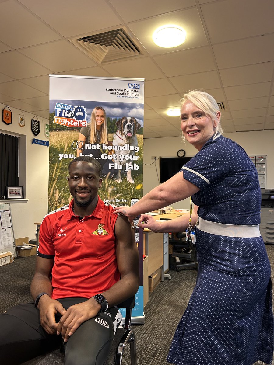 rdash_nhs's tweet photo. Joseph Olowu shows he’s part of the flu defence ⁦@drfc_official⁩    by having his flu vac ⁦- Get yours now! #nhs https://t.co/kwIRMbjCcd