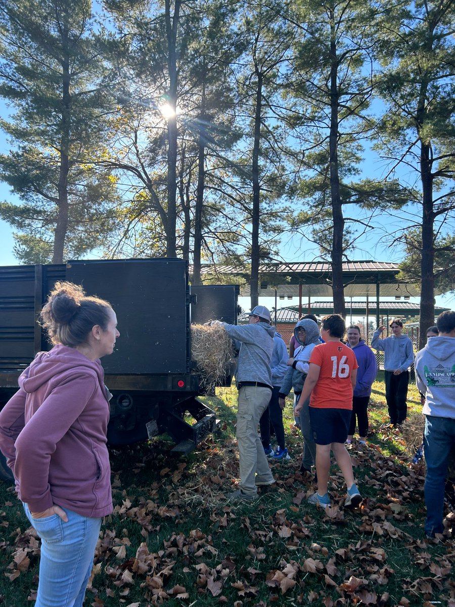 BlueCollarP2022's tweet photo. Keith Dodson, founder of Blue-Collar Project, is at the Frederick County Career and Technology Center (CTC) today for the annual donation of 30 bales of straw to the Agricultural Department to help winterize the beehives! Big thanks to our partners at Calico Nutrient Management! https://t.co/vOQj0fEjAp