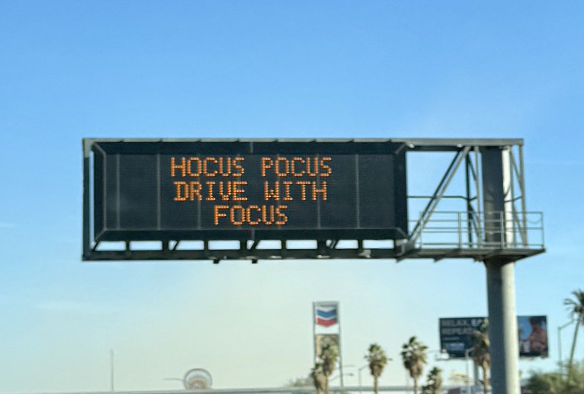VegasIssues's tweet image. Freeway sign guy’s back and he’s feeling festive.