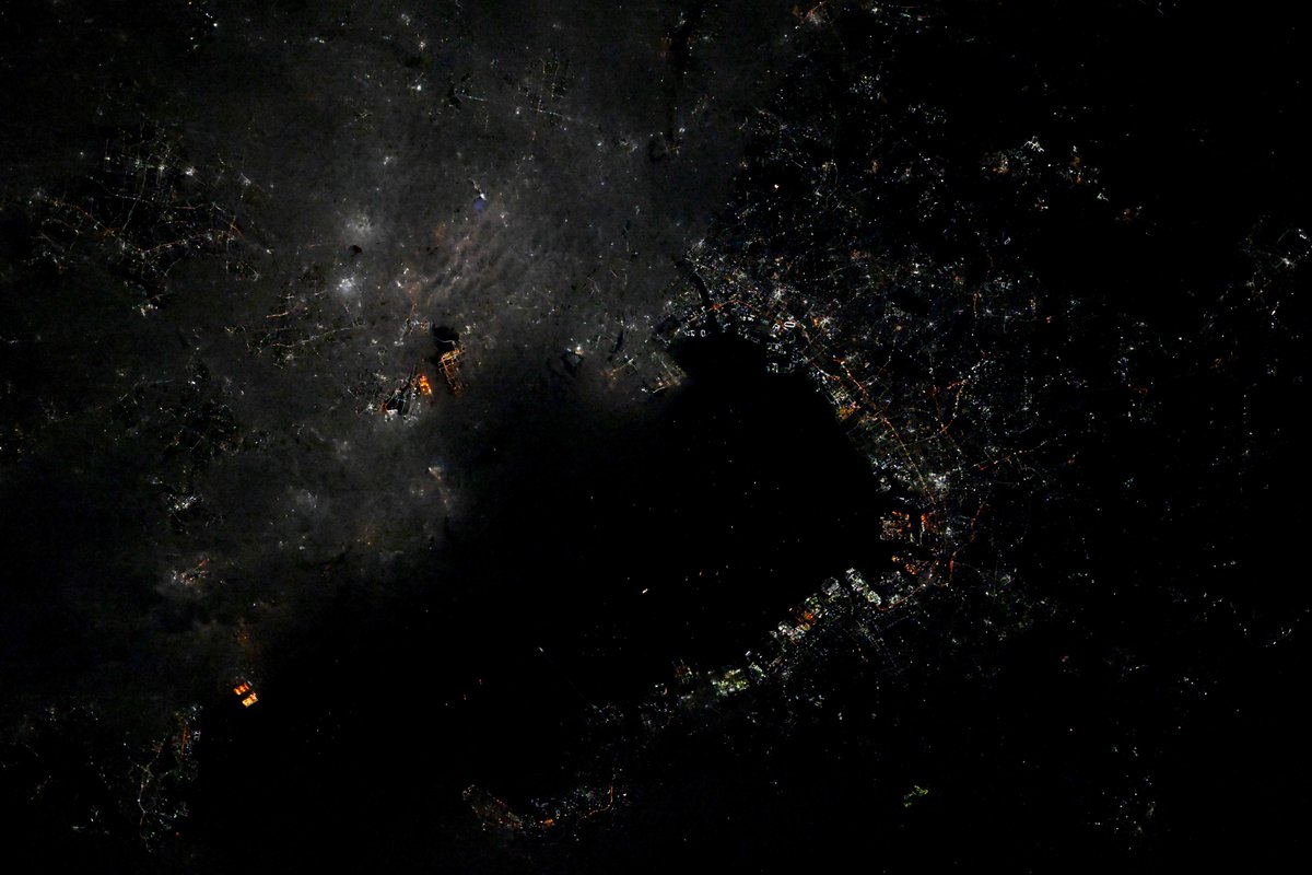 Tokyo, a city with feng shui. While many cities are designed on a master north-south/east-west grid, Tokyo has a flowing natural order as if it is following the movement of Qi.

The first photo was taken on Sunday, Oct. 20, a cloudless orbital path, while the second photo was